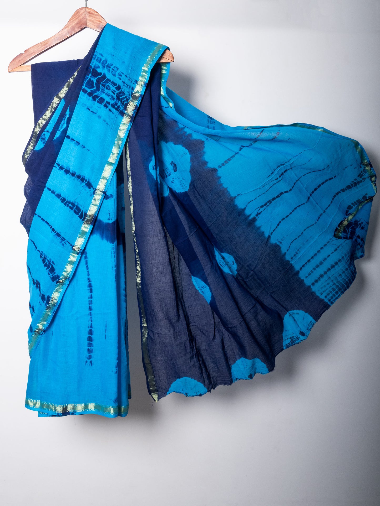 Blue-Sky Blue Tie & dye Cotton Saree with Zari Border