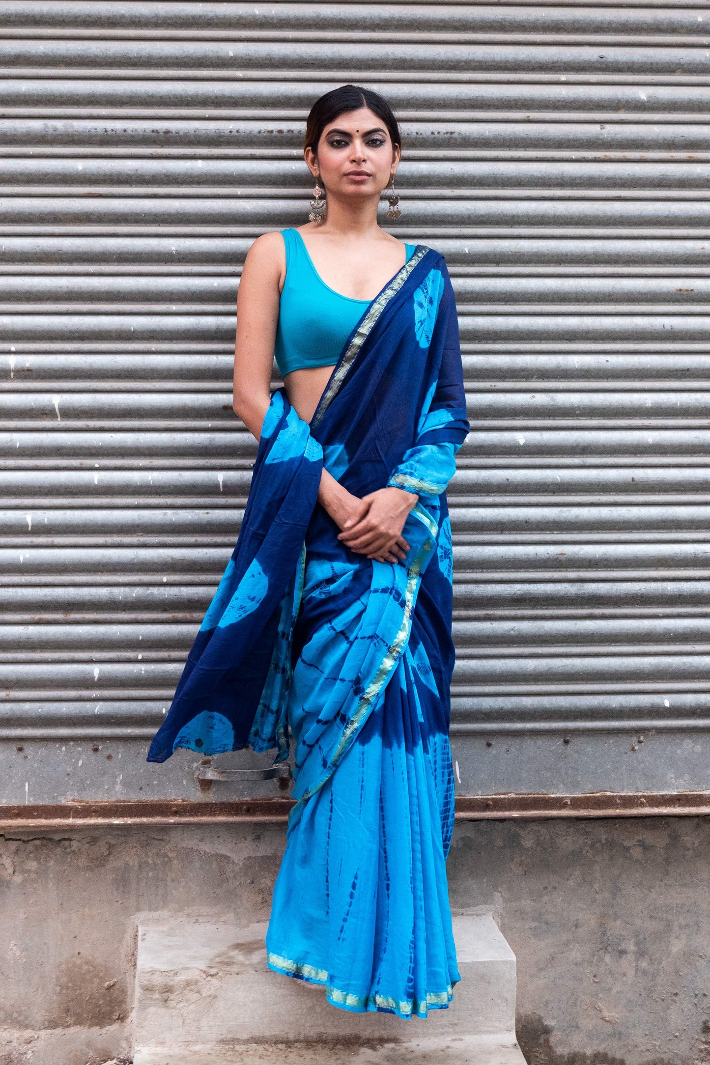 Blue-Sky Blue Tie & dye Cotton Saree with Zari Border