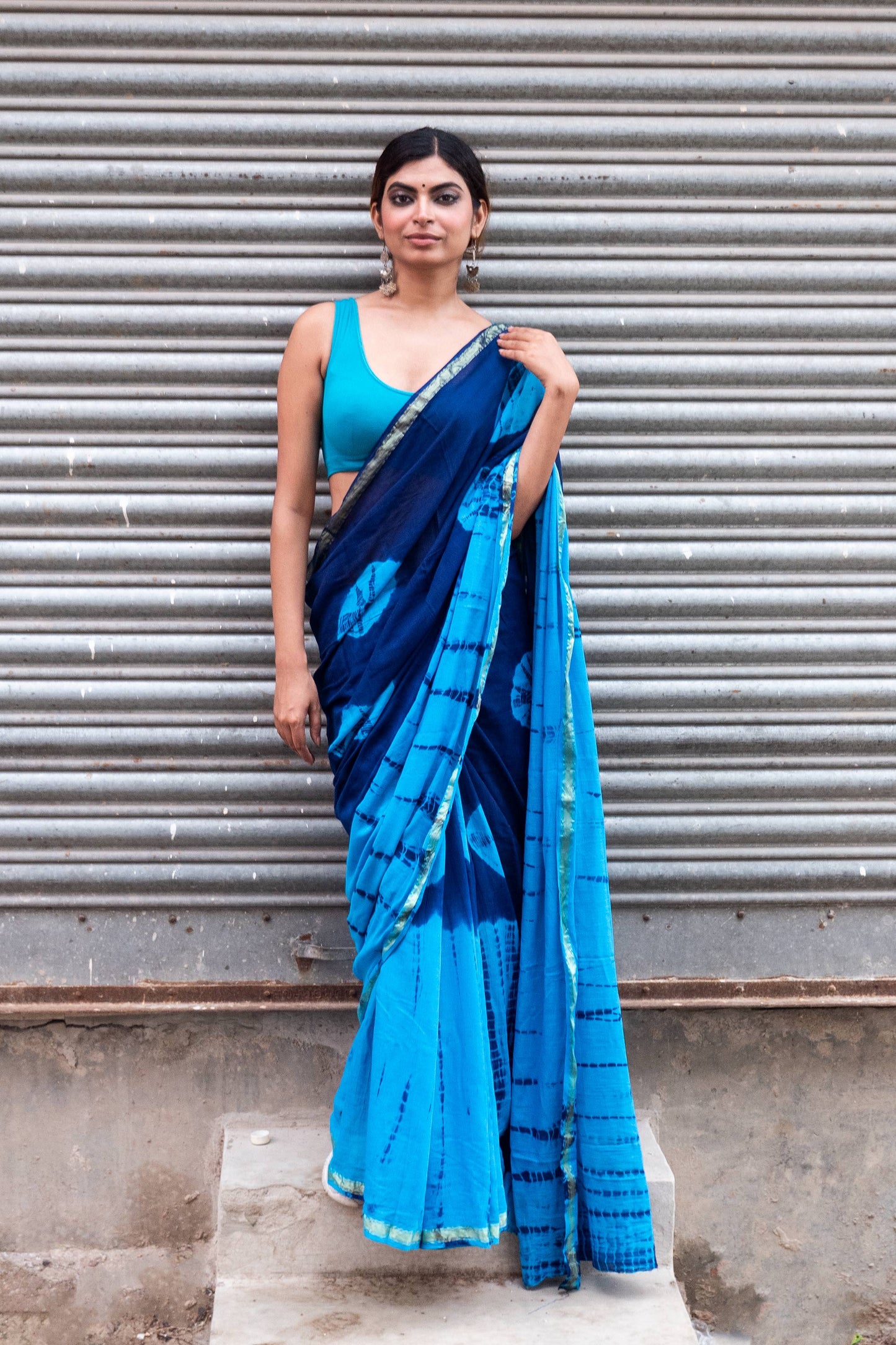 Blue-Sky Blue Tie & dye Cotton Saree with Zari Border