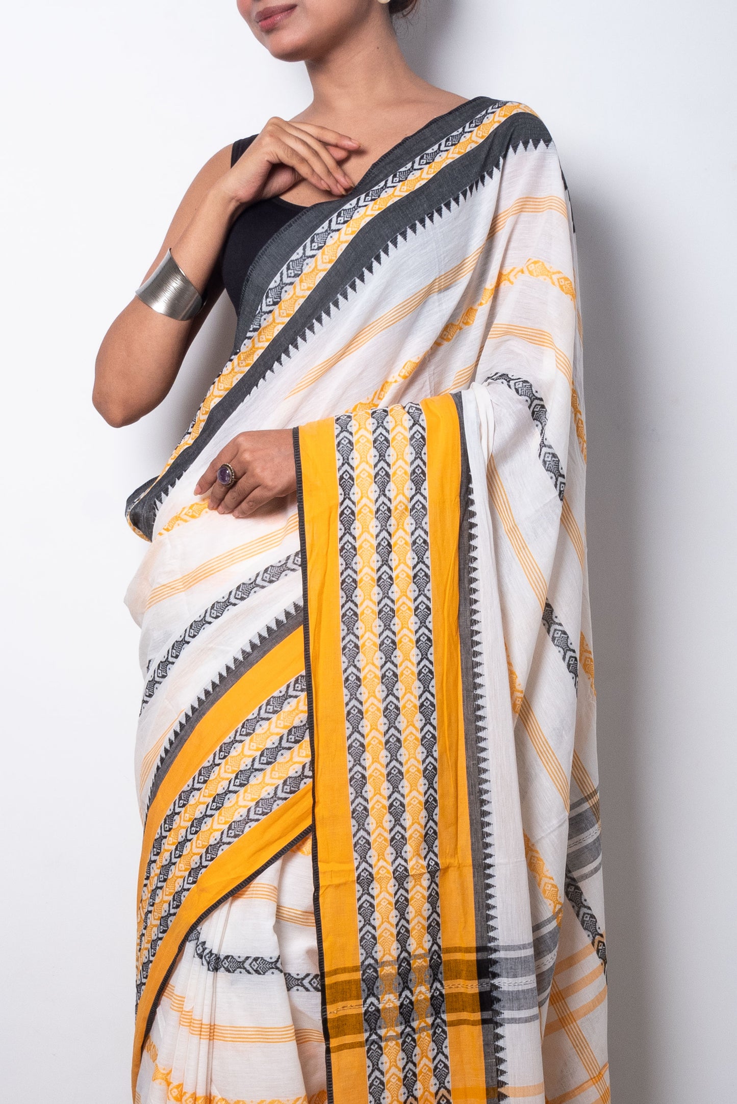 White Dhaniakhali Cotton Saree with Yellow-Black Fish Motifs woven Border