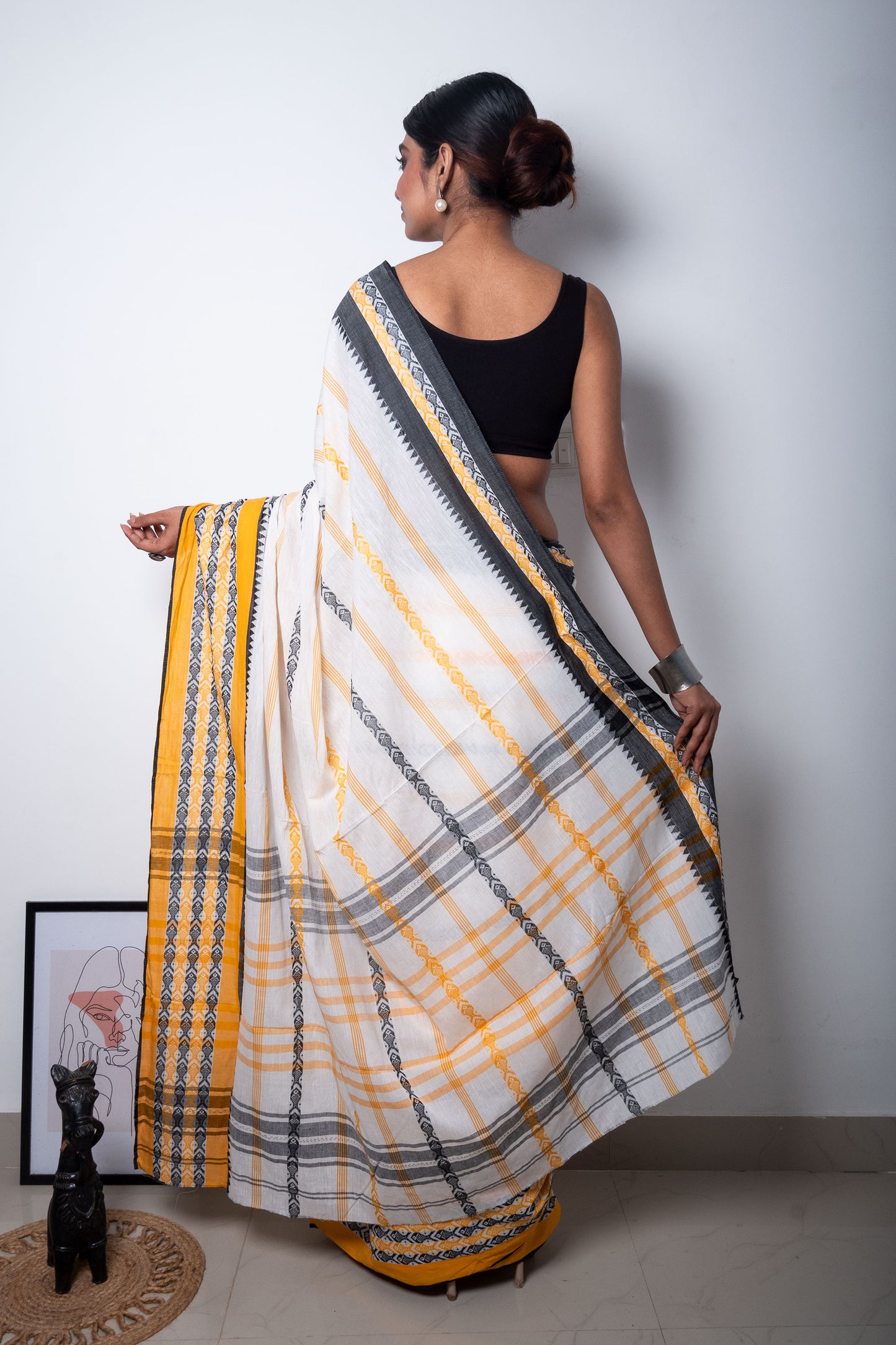White Dhaniakhali Cotton Saree with Yellow-Black Fish Motifs woven Border
