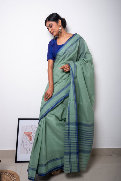 Pastel Green Dhaniakhali Cotton Saree with Blue Thin Temple Border