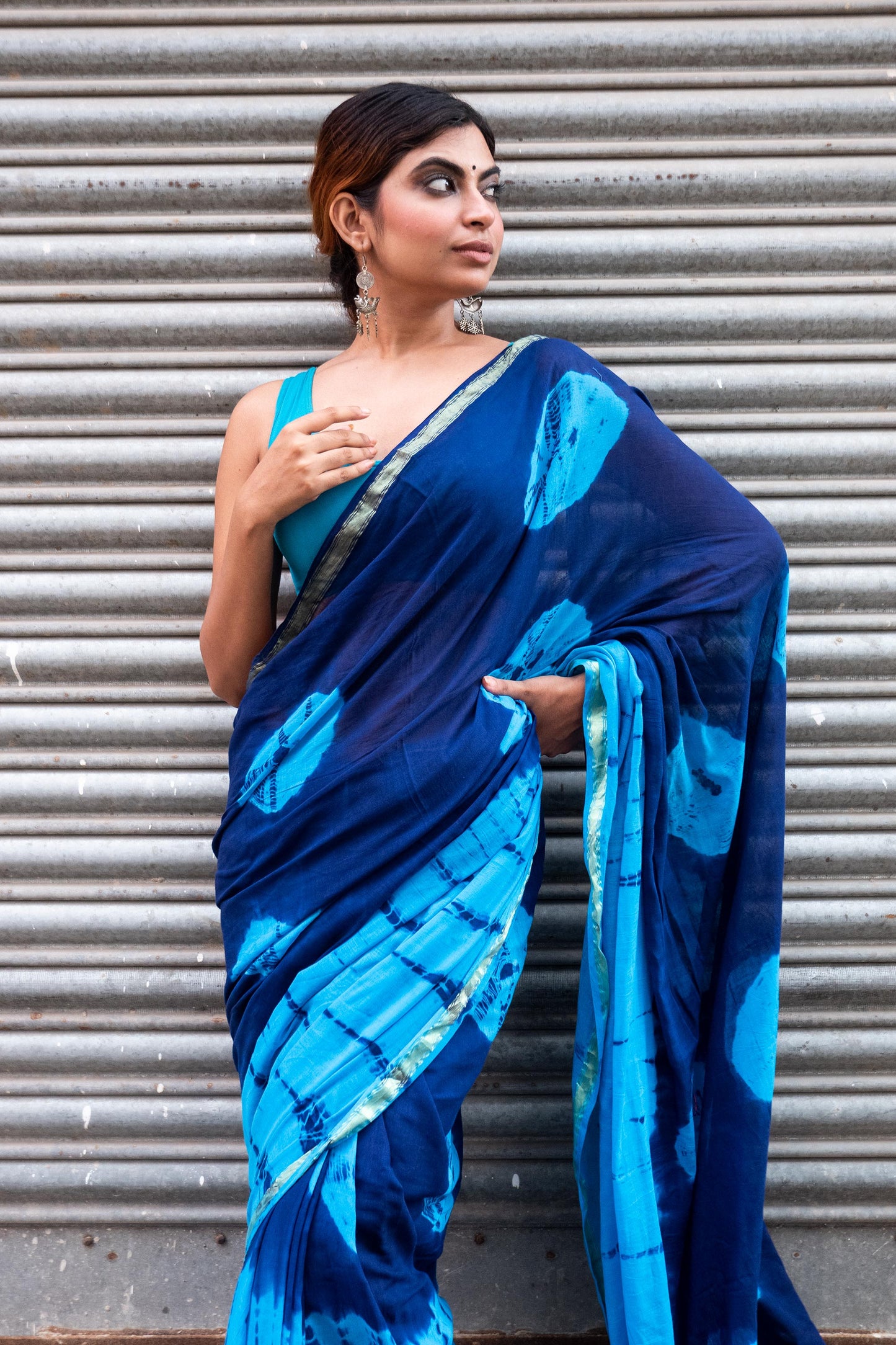 Blue-Sky Blue Tie & dye Cotton Saree with Zari Border