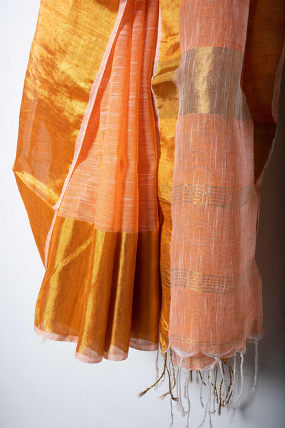 Orangey Peach Linen by Linen Saree with Zari Borders