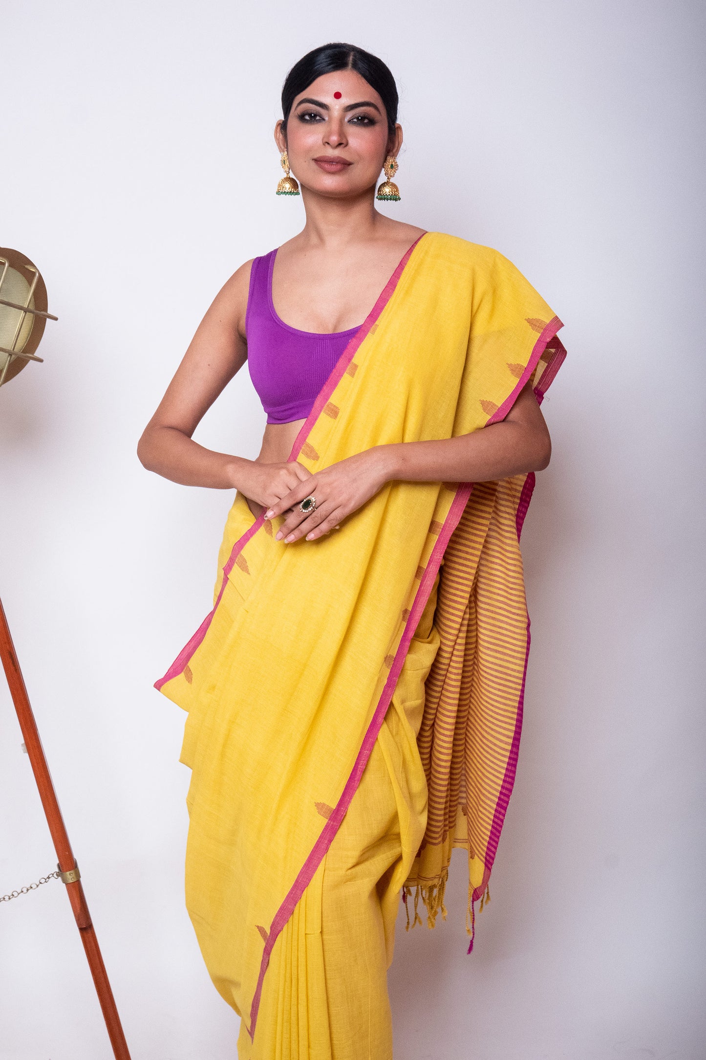 Saffron Yellow Fulia Cotton Saree with Purple Temple Woven Border