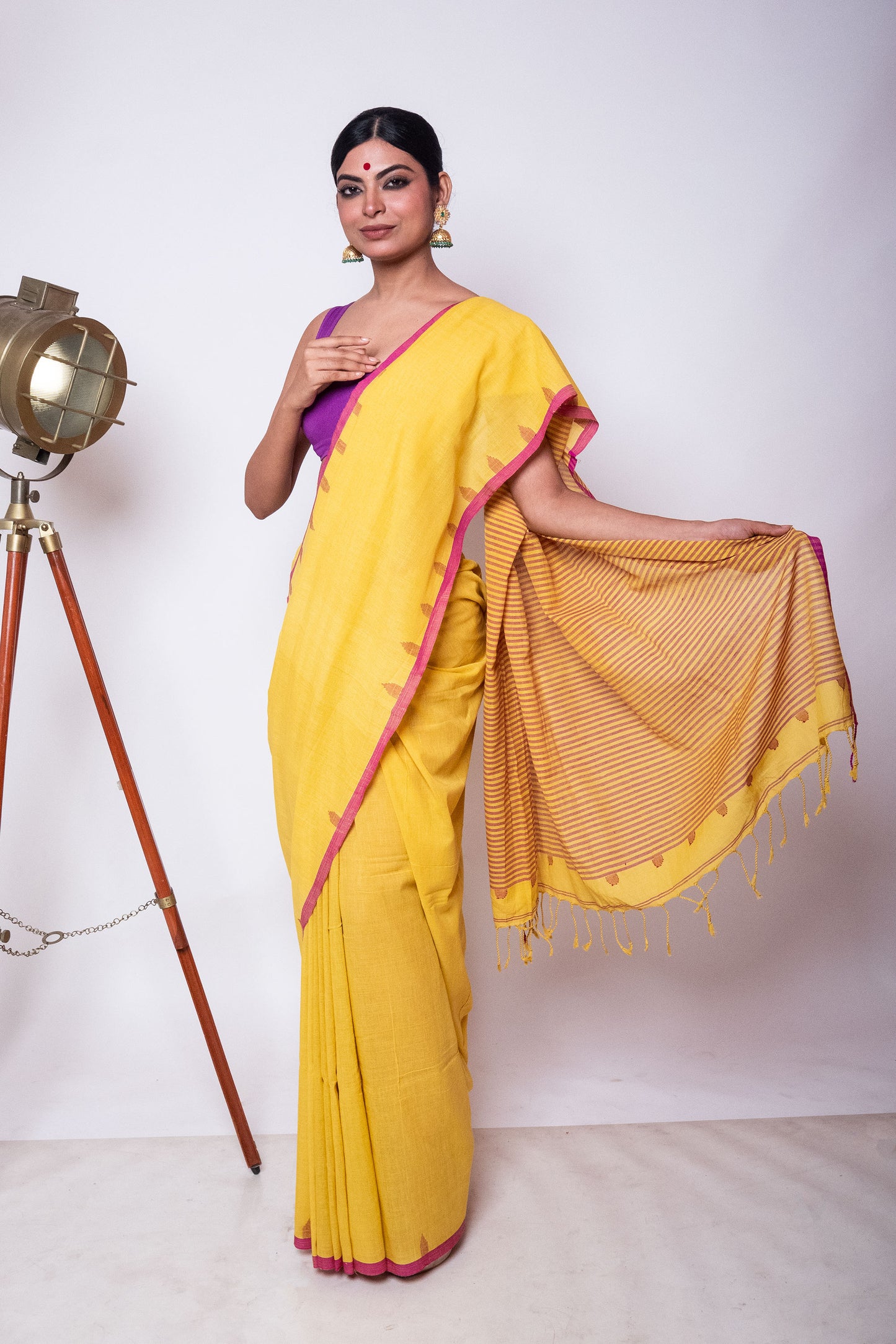 Saffron Yellow Fulia Cotton Saree with Purple Temple Woven Border