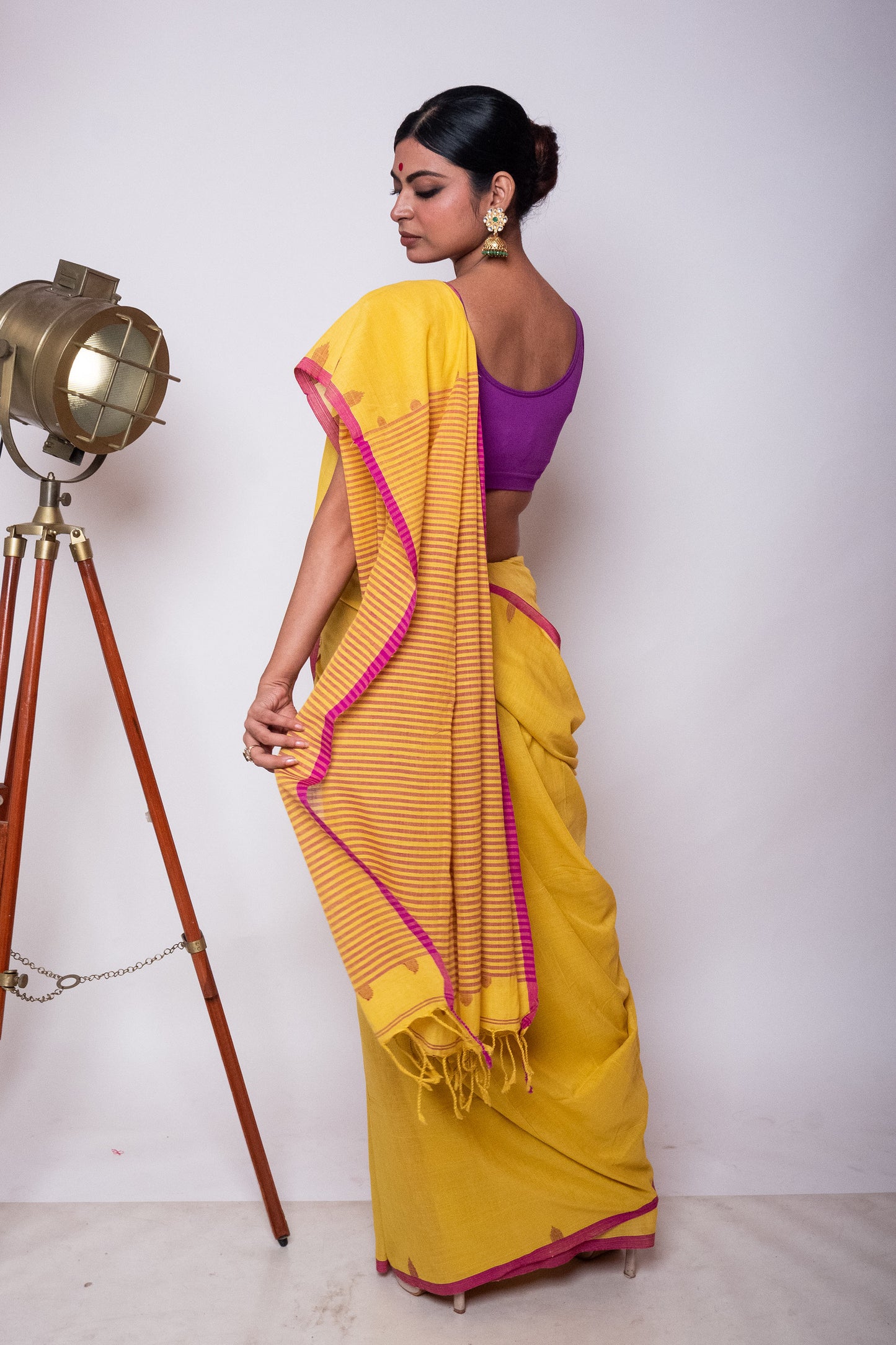 Saffron Yellow Fulia Cotton Saree with Purple Temple Woven Border