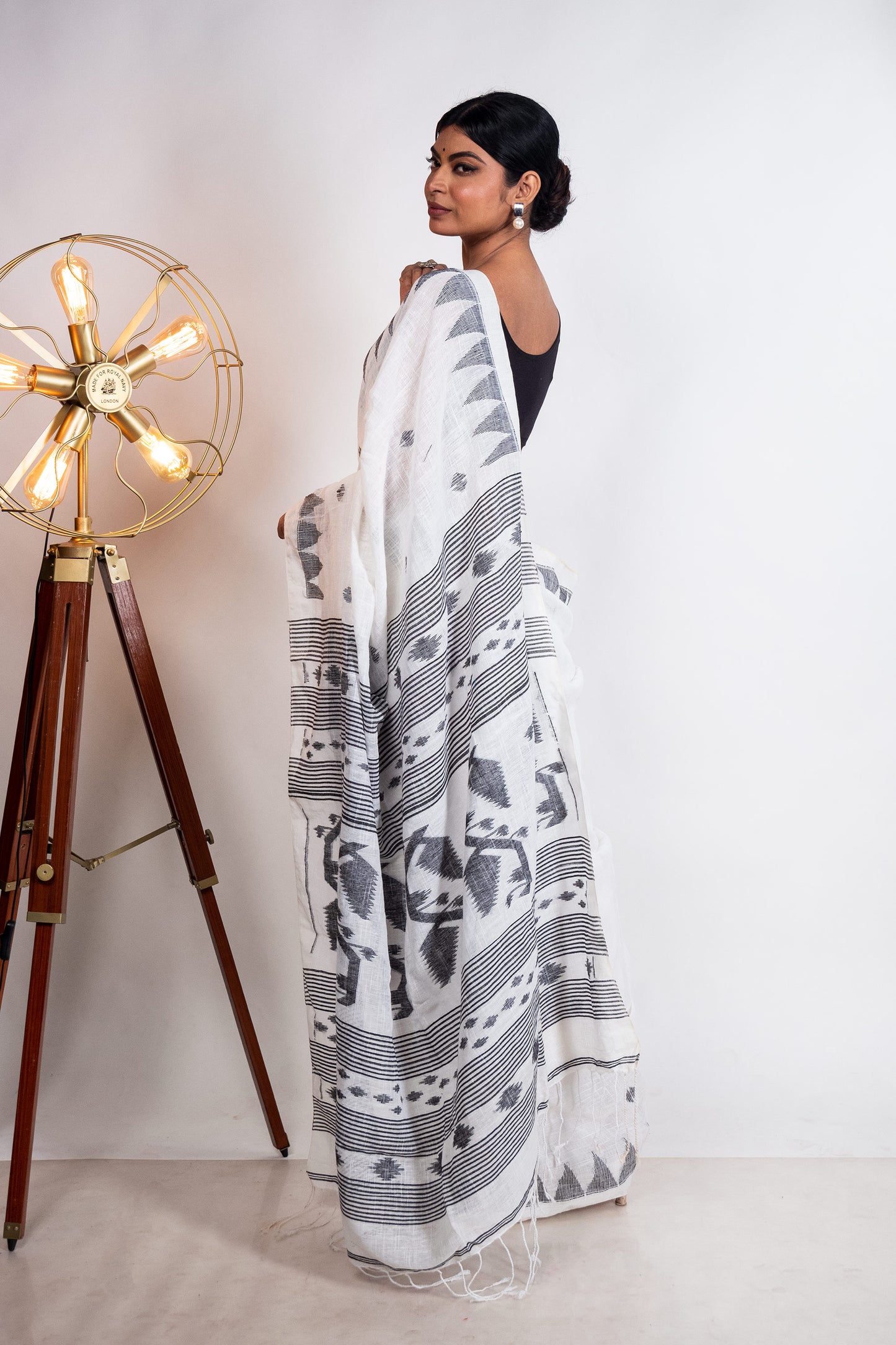 White Linen by Linen with Black Jamdani Woven Saree