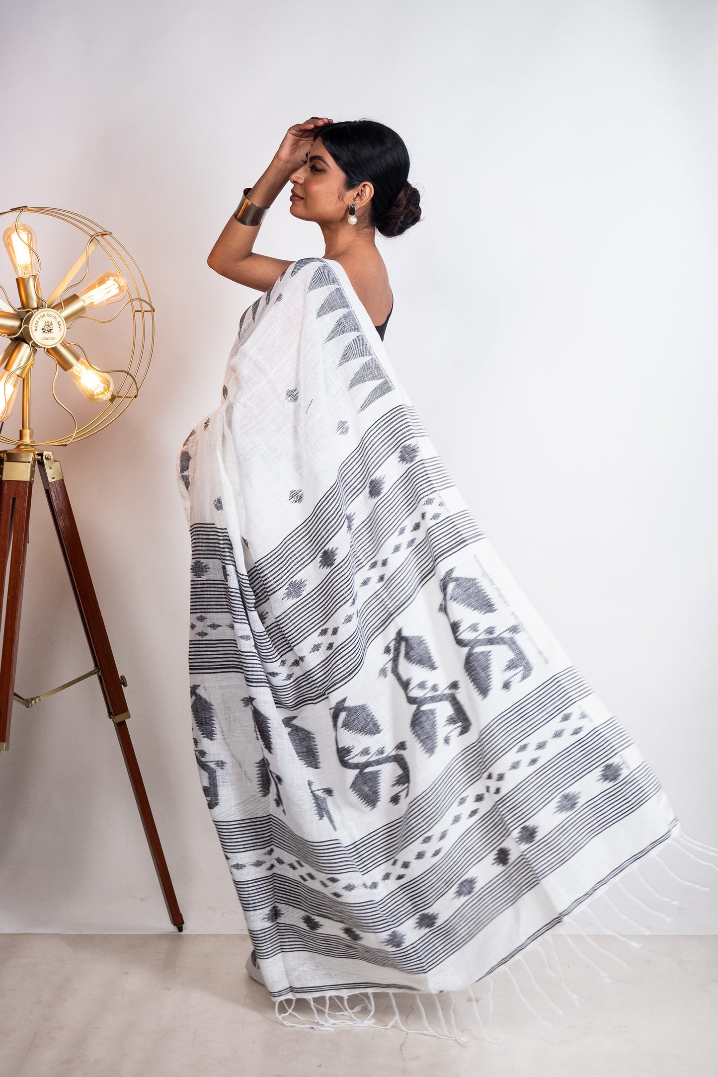 White Linen by Linen with Black Jamdani Woven Saree