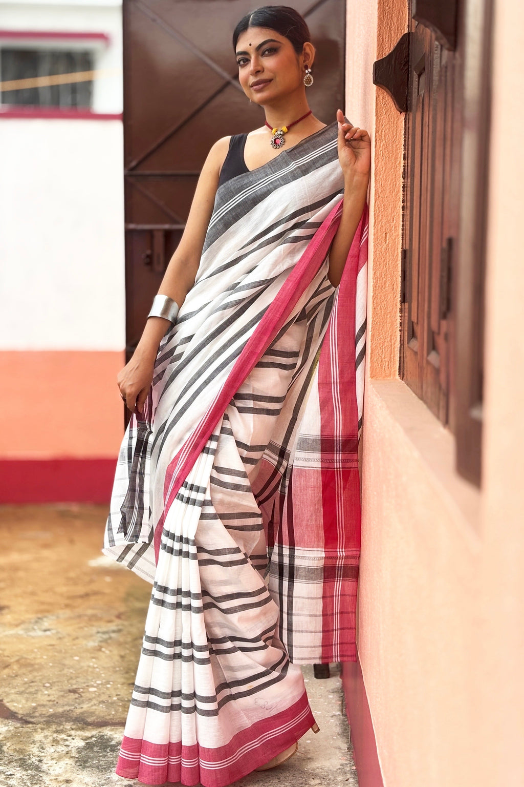 White Cotton Dhaniakhali Saree with Black stripes and Ganga Jamuna Borders