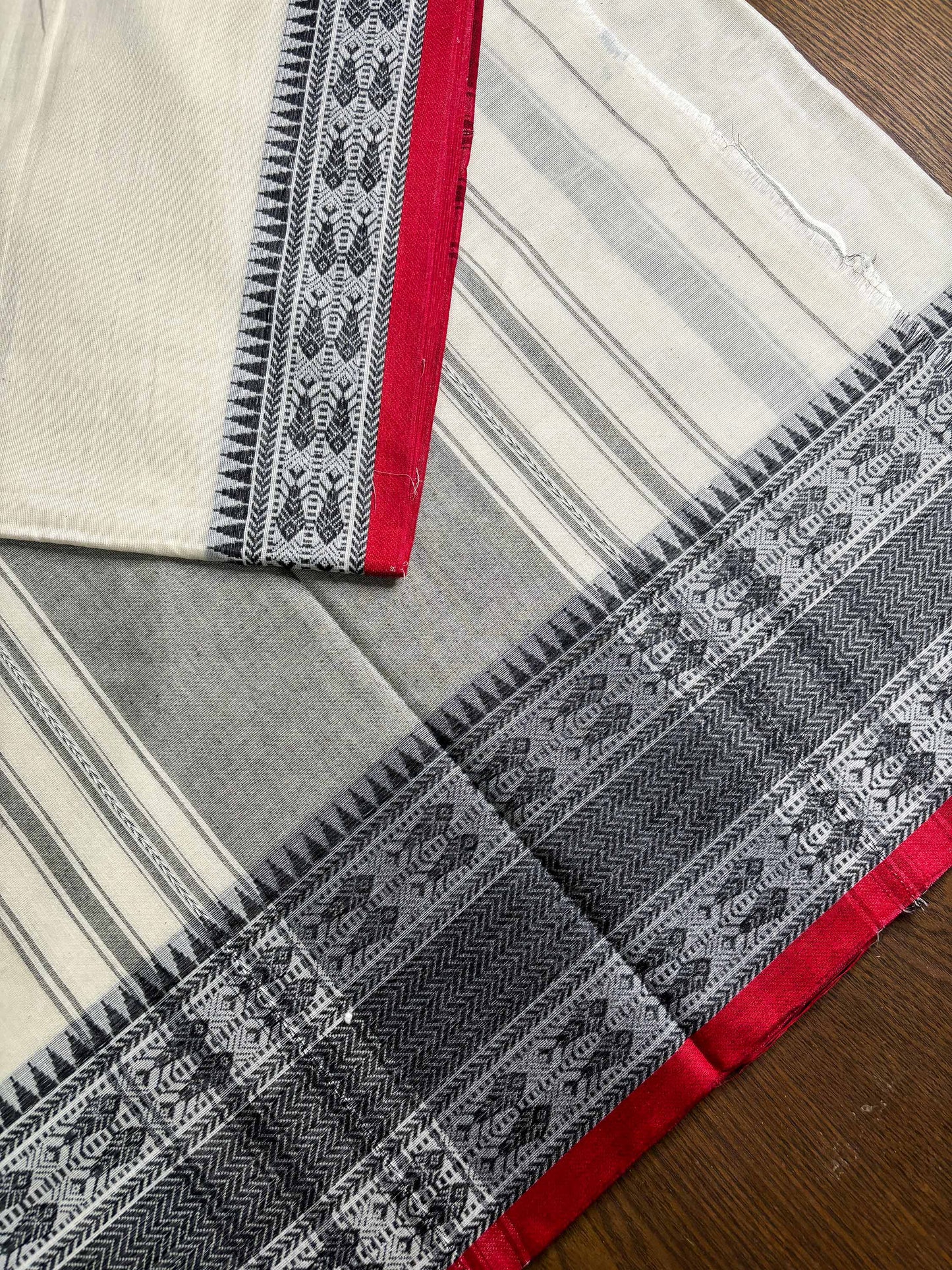 White Cotton Dhaniakhali Saree with Fish Woven Border